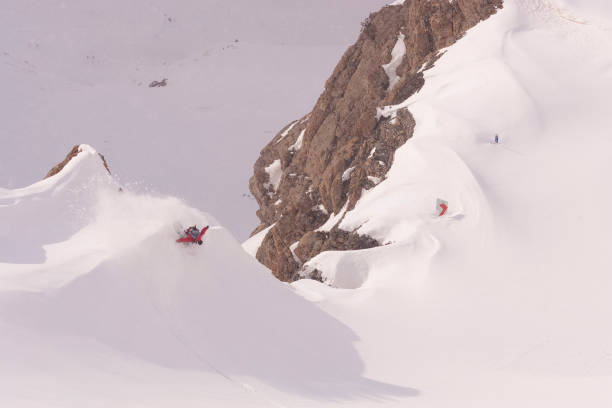 istock Snowboarder turning in powder in Iran. 1197077209