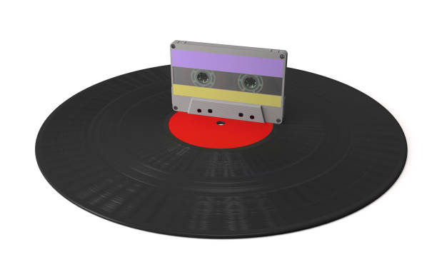 istock Vinyl gramophone disc and audio cassette (3d illustration). 1197078350