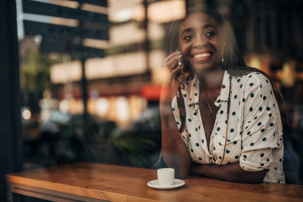 istock Young woman at the cafe 1197078363