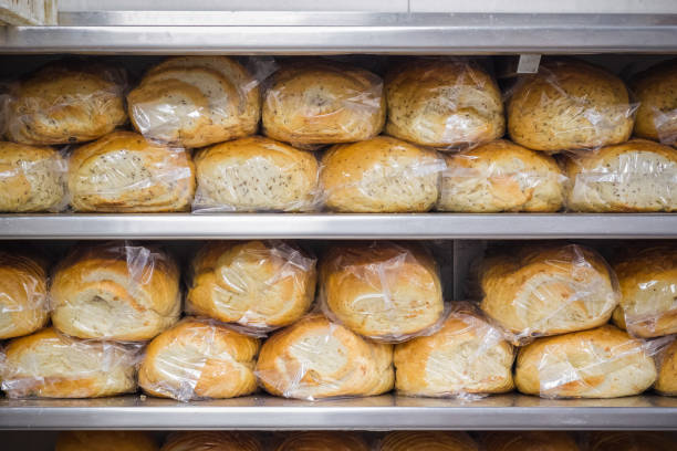 istock Breads displayed on shelves at Brick Lane bakery Beigel Bake in London 1197081833