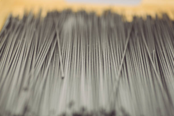 istock Pasta fresh (black spaghetti) in classic style on white background. Homemade cooking 1197082347
