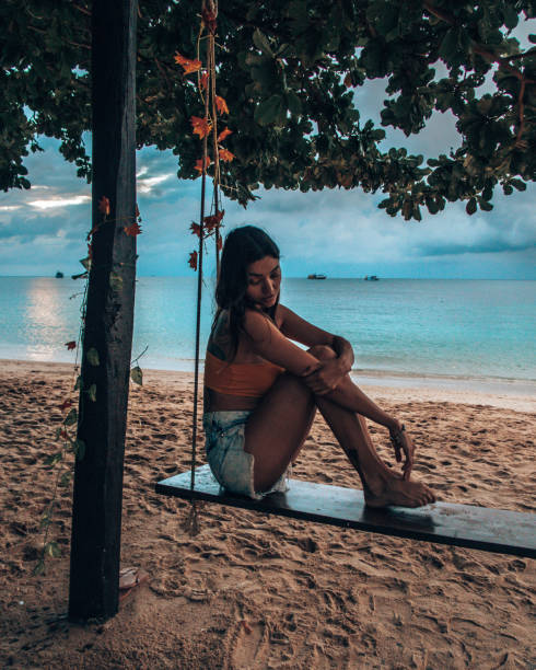 istock Girl having fun on the swing 1197082385
