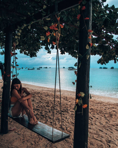 istock Girl having fun on the swing 1197083122