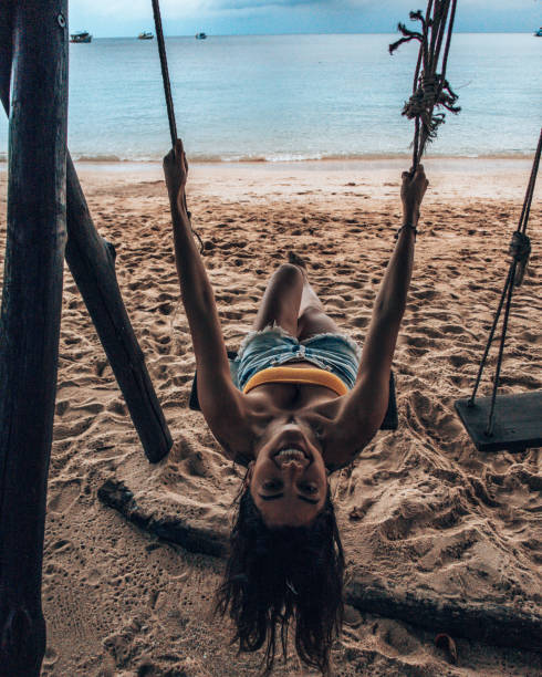 istock Girl having fun on the swing 1197083427
