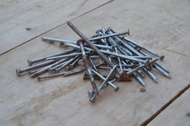 istock pile of steel nails 1197083430