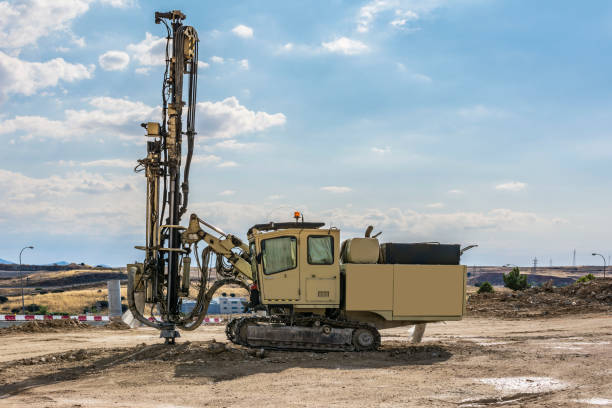 istock Rock drilling machine to make hole and build a building 1197084662