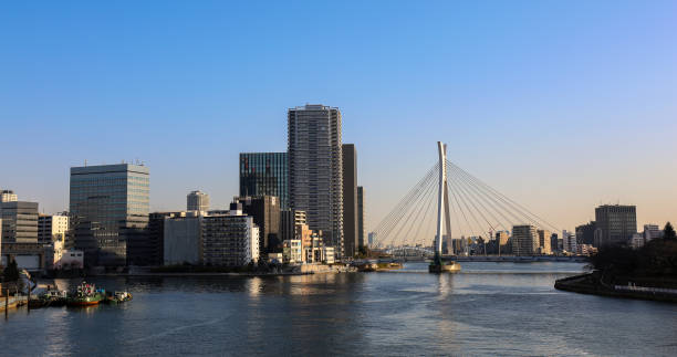 istock Tokyo sunny cityscape under blue sky with bridges and Sumida river 1197085642