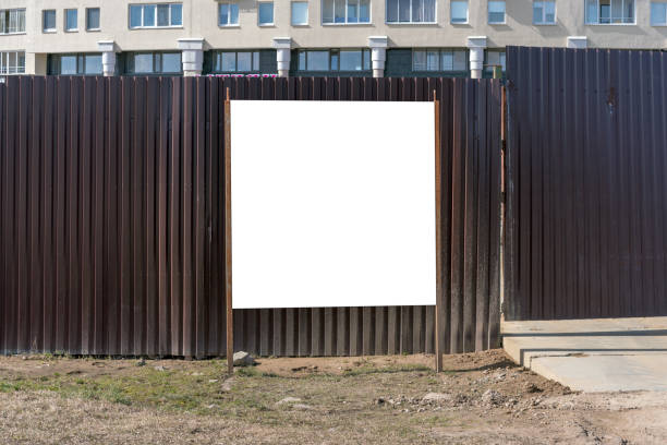 istock information board in front of construction site mock-up 1197085959