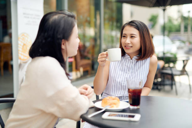 istock Women friends gossiping during coffee time. 1197087657