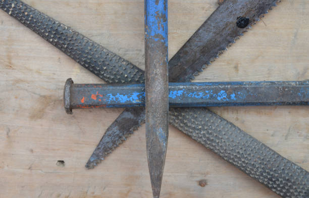 old construction of a house and repair tools on wooden background