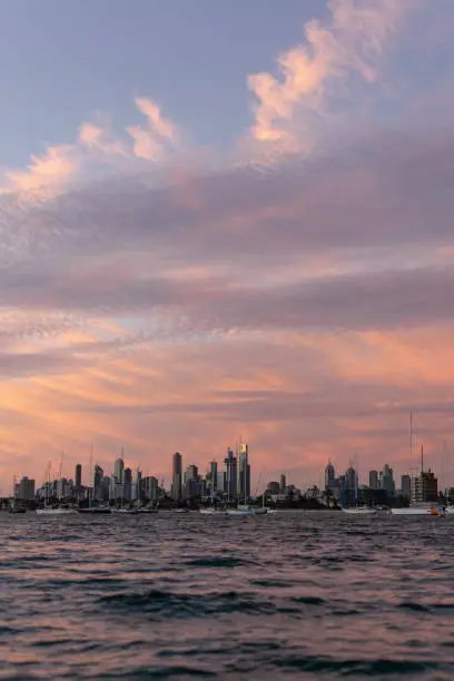 Water views of Melbourne skyline at sunset from St Kilda Pier