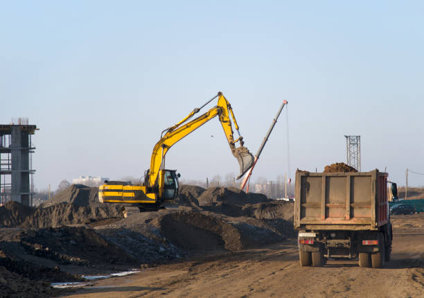 istock Excavator load the sand to the dump truck on construction site. 1197093108