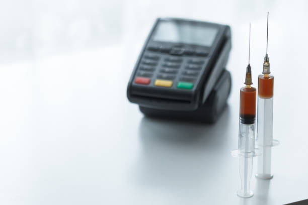 istock card terminal on the drugs background 1197094515