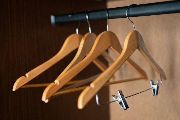 istock some empty wooden hangers inside the home vintage wardrobe 1197095329
