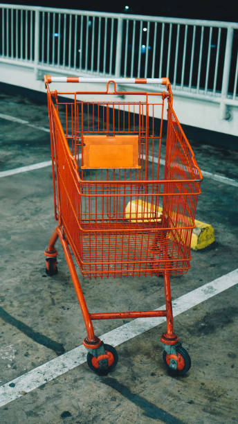 istock Empty Shopping Cart in Parking Lot 1197096691