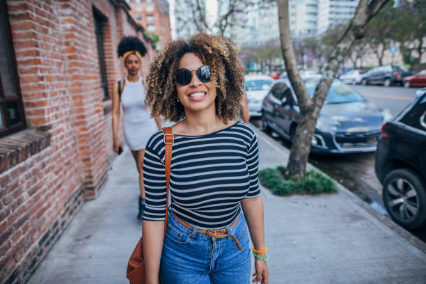 istock Three young women walking outdoors 1197097093