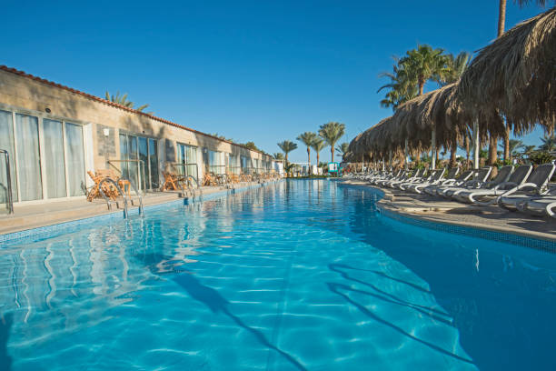 istock Swimming pool in a luxury tropical hotel resort 1197098664