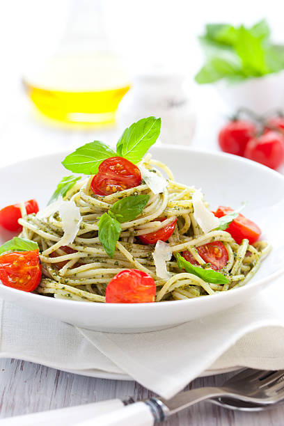 istock spaghetti with  pesto and tomato 119709910