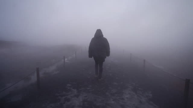 Walking through thick fog on Iceland