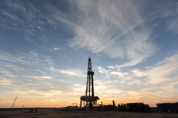 istock Fracking Drilling Rig at the Golden Hour 1197100750