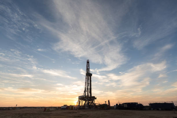 istock Fracking Drilling Rig at the Golden Hour 1197101223