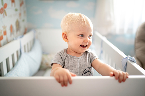 Blonde Baby Boy Inside The Crib Stock Photo - Download Image Now - Baby ...