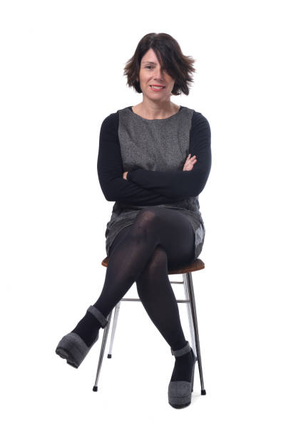 istock woman sitting on white background 1197102759