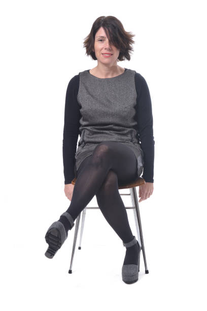 istock woman sitting on white background 1197103040