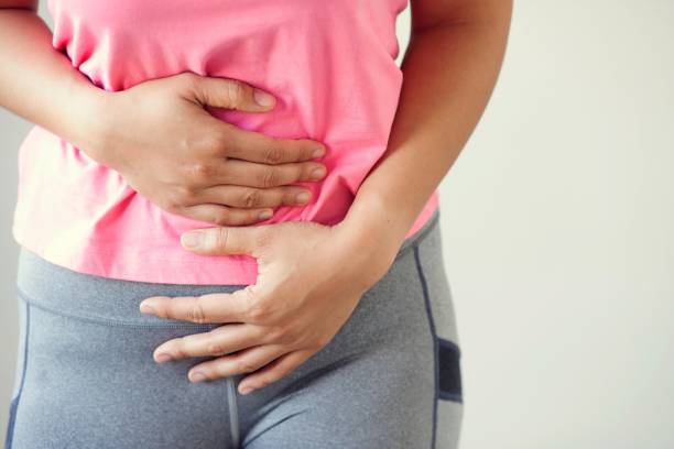 istock Women rush to urinate in the bathroom. 1197103255