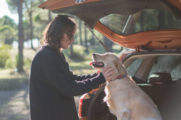 istock Young man traveling with his dog 1197103357