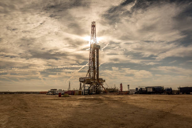 istock Fracking Drilling Rig at the Golden Hour 1197107118
