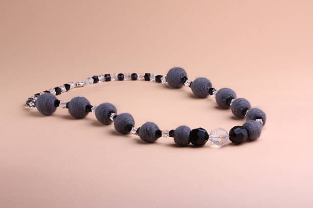 istock Grey necklace at pink background 119710727