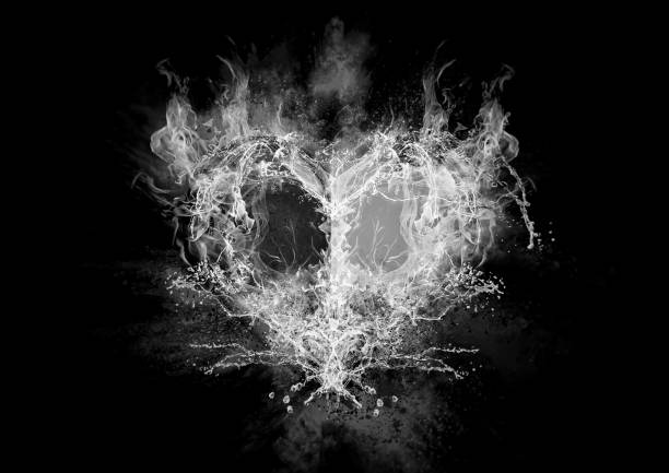 istock Abstract heart shape with flames and splashes 1197107985
