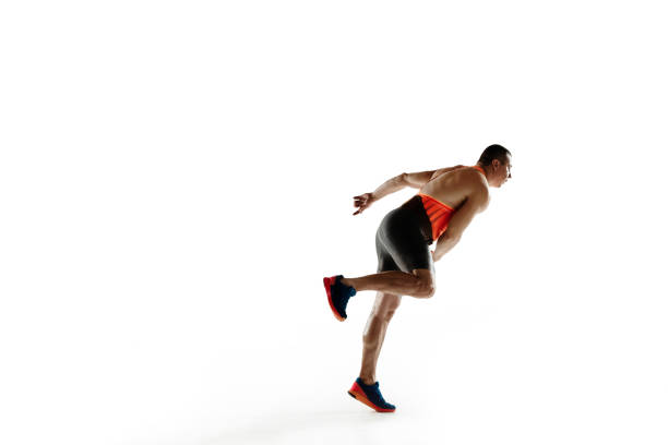 istock Male athlete practicing in throwing javelin isolated on white studio background 1197113189