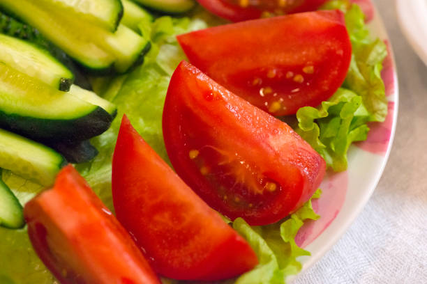 istock Fresh Cucumber and Tomato Salad 1197114571