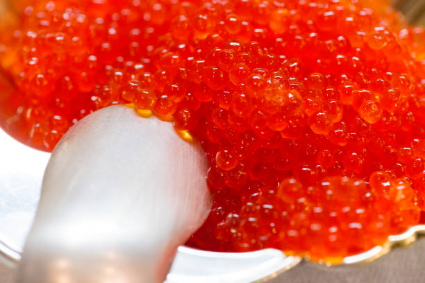 istock Red caviar in a silver bowl. 1197115052