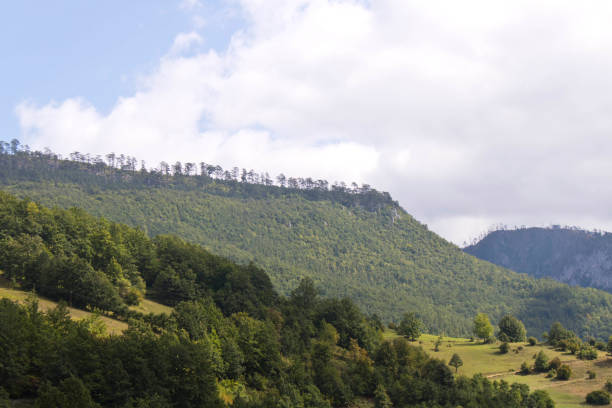 istock Mountains against the blue sky . Mountains in Montenegro. Selective focus. 1197124632