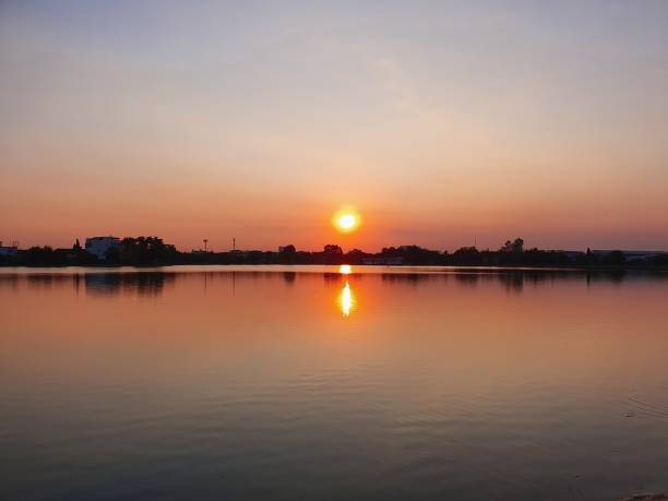 istock Sunset over the lake background 1197124830