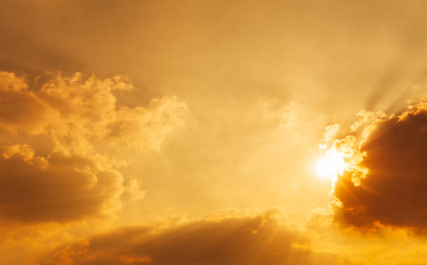 istock Shining sun on sky and clouds nature orange sky background 1197128992