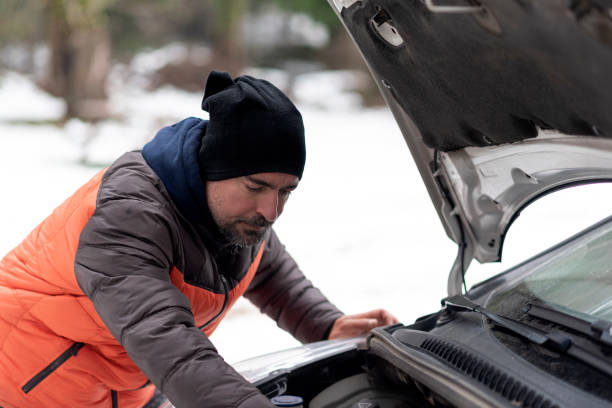 istock car breakdown on a snowy winter day 1197129818