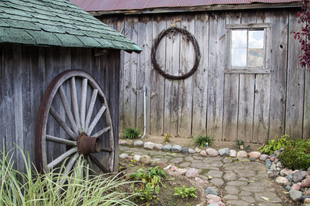 istock Rustic Old Gardeners Shed With Winding Stone Path 1197130204