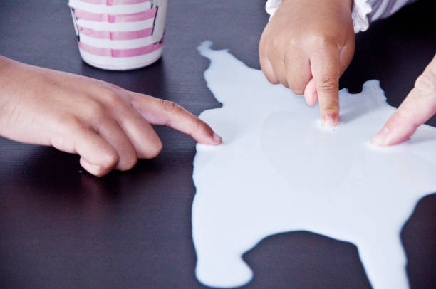 Messy Eater : Spilled Milk On Table