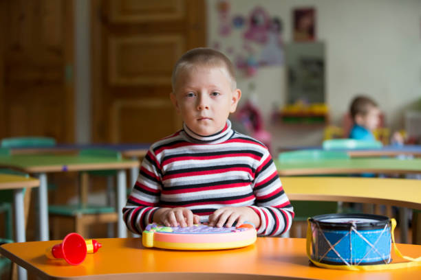 istock Preschooler boy in kindergarten. 1197136833