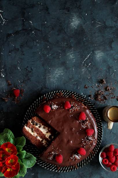 istock Chocolate cake with fruits on stone background. 1197136899