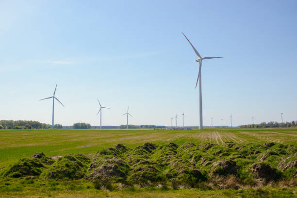 istock Bright blue sky moving and wind turbine 1197136921