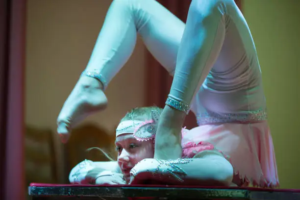 Flexible girl gymnast.Girl with an incredible stretch shows