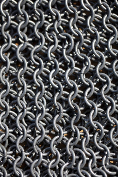 istock Vertical texture of metal chain mail 1197138837