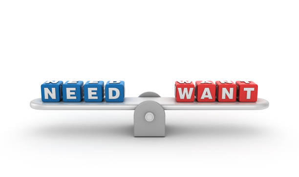 istock Seesaw with NEED WANT Buzzword Cubes - 3D Rendering 1197141045
