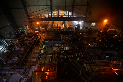 Glassworks. Industrial furnace for the manufacture of glass in the workshop of the plant.