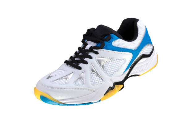 istock White sneaker with blue stripes on a white background. Sport shoes. 1197142271